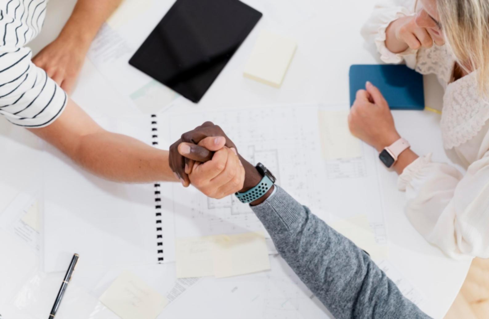 Financial analysts reviewing valuation models during practical training session